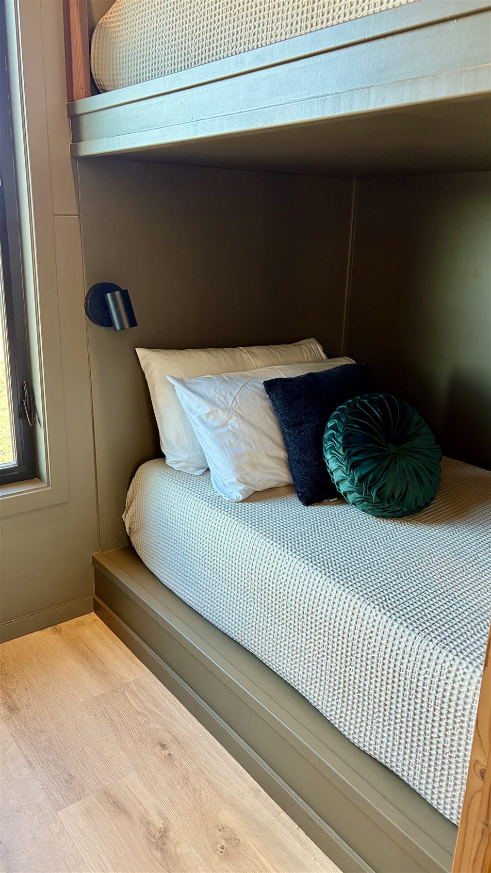 Lower twin bunk bed at Glacier Mountain Getaway