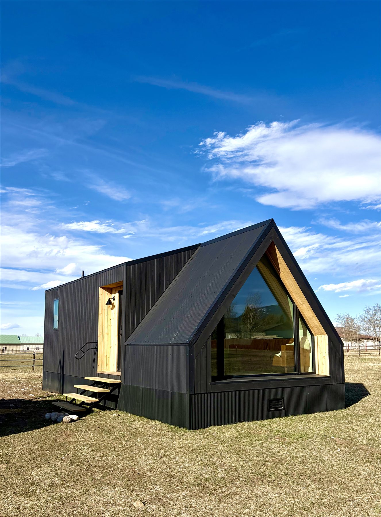 Modern A-frame cabin exterior at Glacier Mountain Getaway in Bozeman Montana