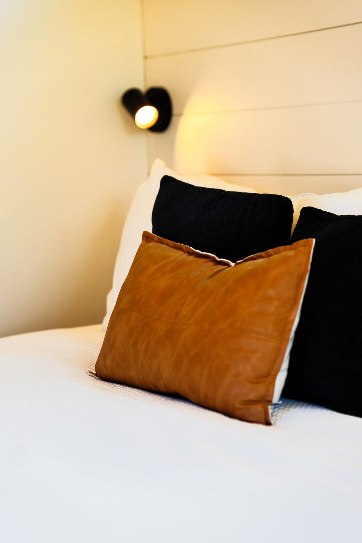 Pillows and bedding detail at Glacier Mountain Getaway near Bozeman Montana