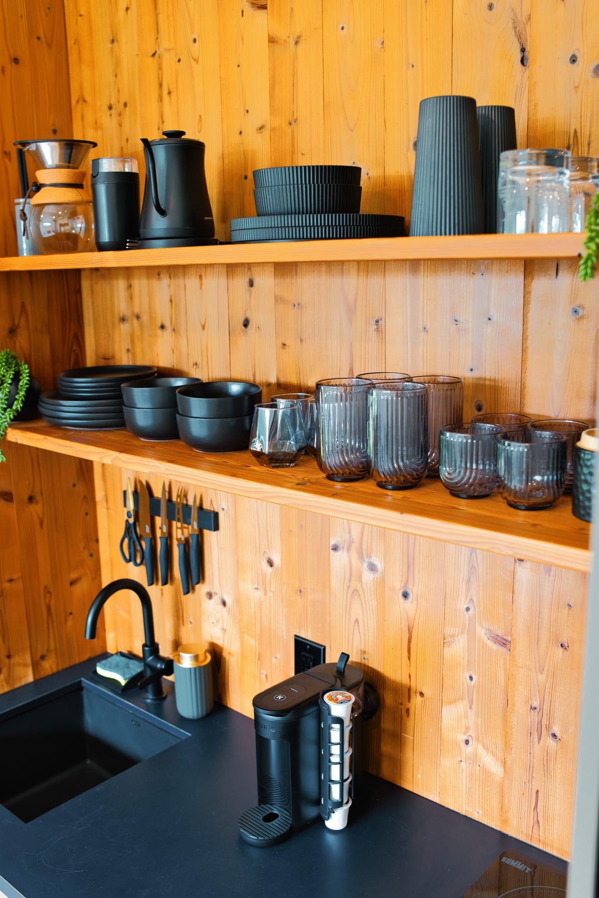 Top shelves of kitchenette at Glacier Mountain Getaway near Bozeman Montana