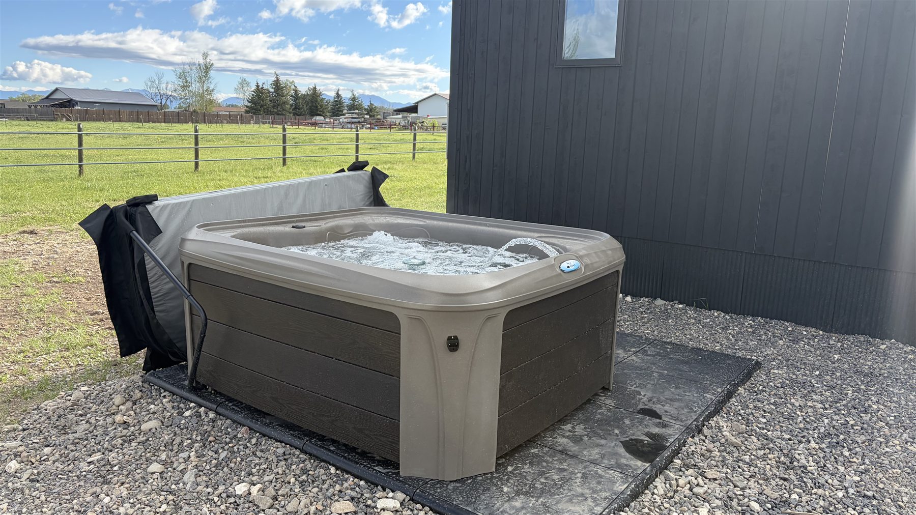 Private hot tub patio at Glacier Mountain Getaway near Bozeman
